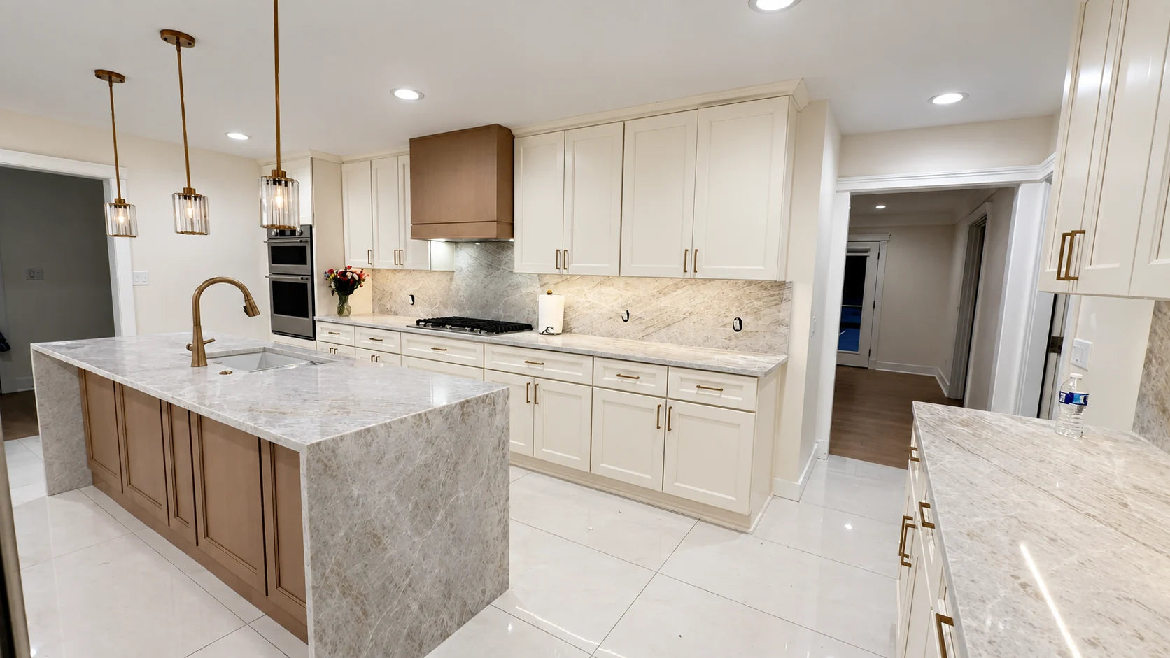 AI-enhanced kitchen with Whipped Cream cabinetry and a contrasting wood island